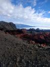 red lava with Mauna Kea in background