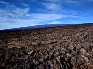 The peak looms in the distance 10 miles away